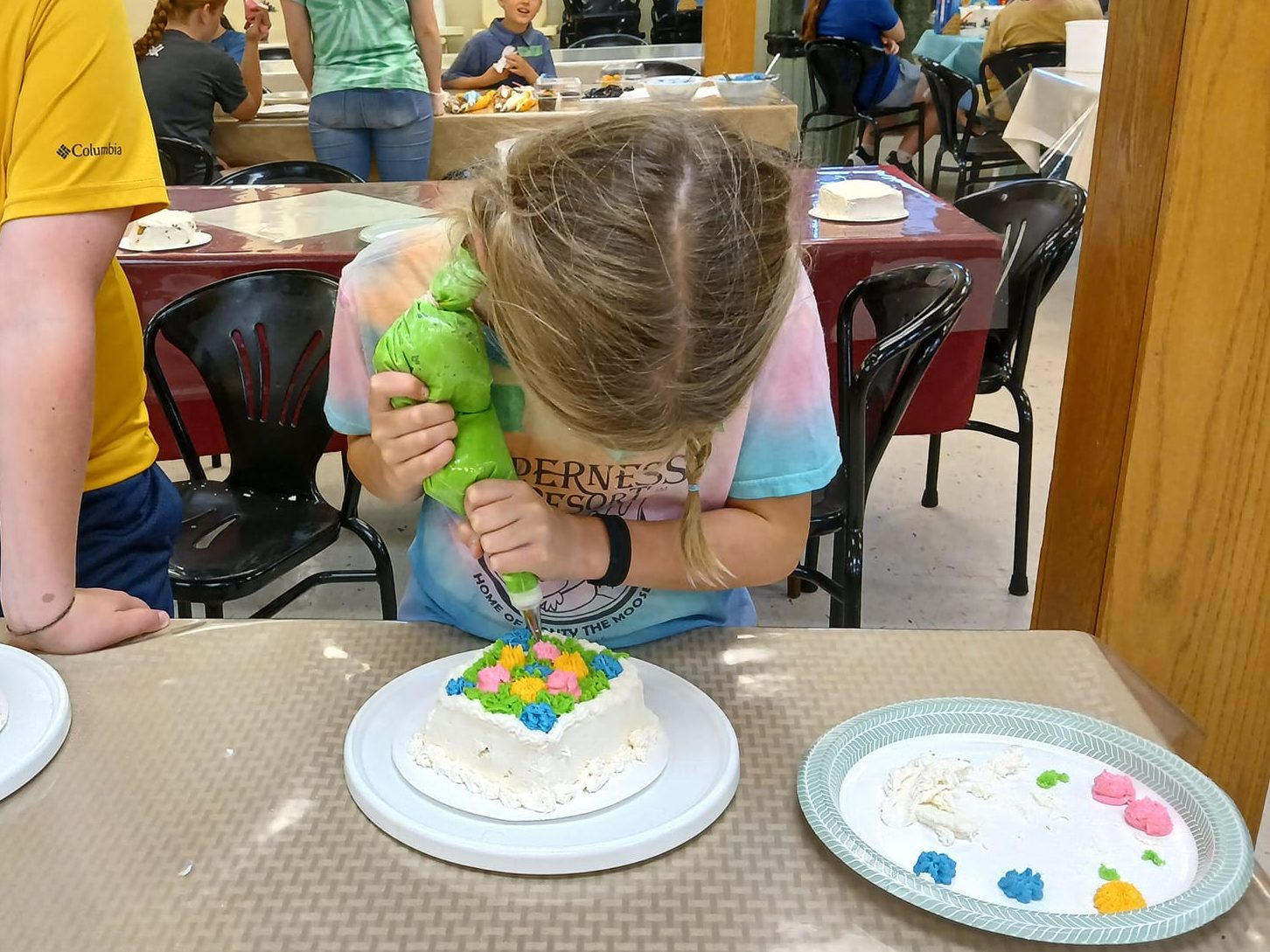 practicing cake decorating